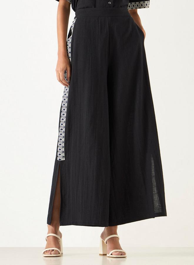 تواكستريمز بنطلون واسع الساقين بتطريزات من تو إكستريمز - Image 1