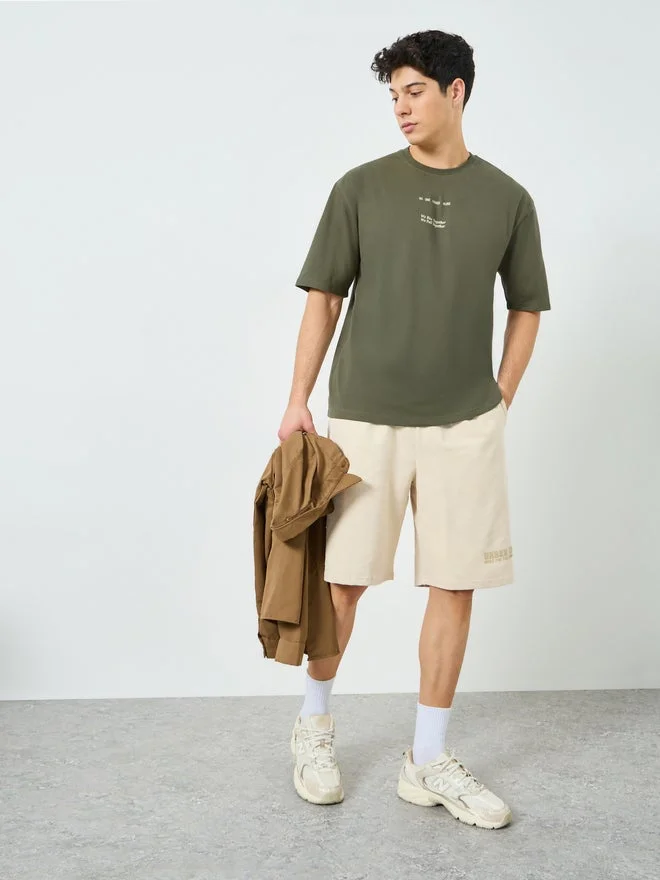 ستايلي Styli Men Oversized Slogan Print Crew Neck T-Shirt