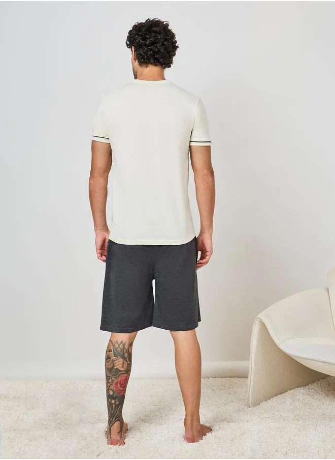 Styli Slogan Print T-Shirt & Plain Shorts Set