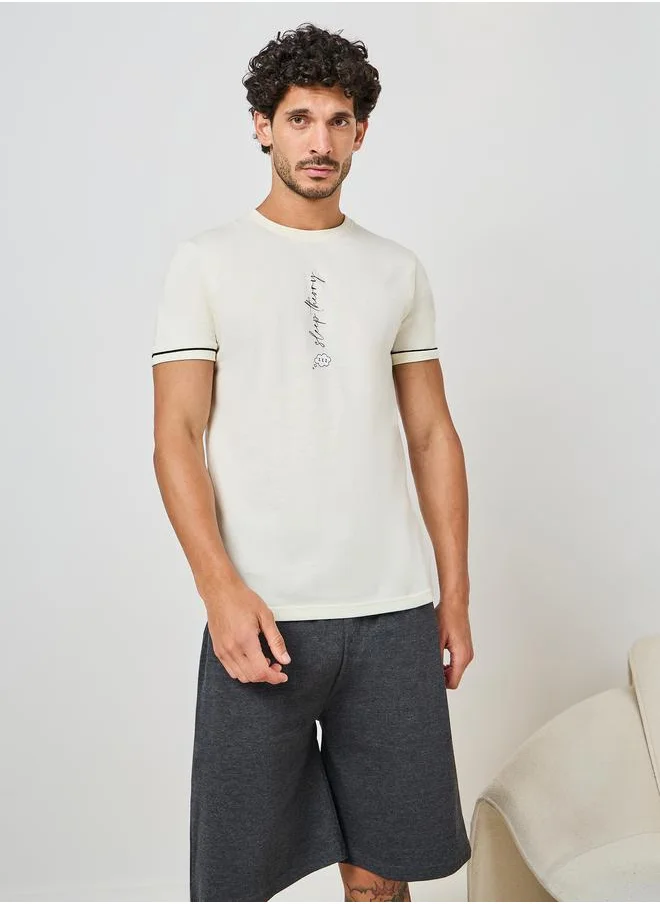 ستايلي Slogan Print T-Shirt & Plain Shorts Set