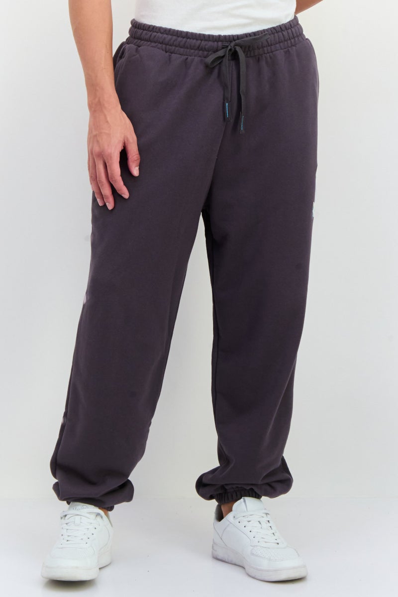 PUMA Puma x The Smurfs Men Sportswear Fit Drawstring Outdoor Sweatpants, Dark Grey - Image 1
