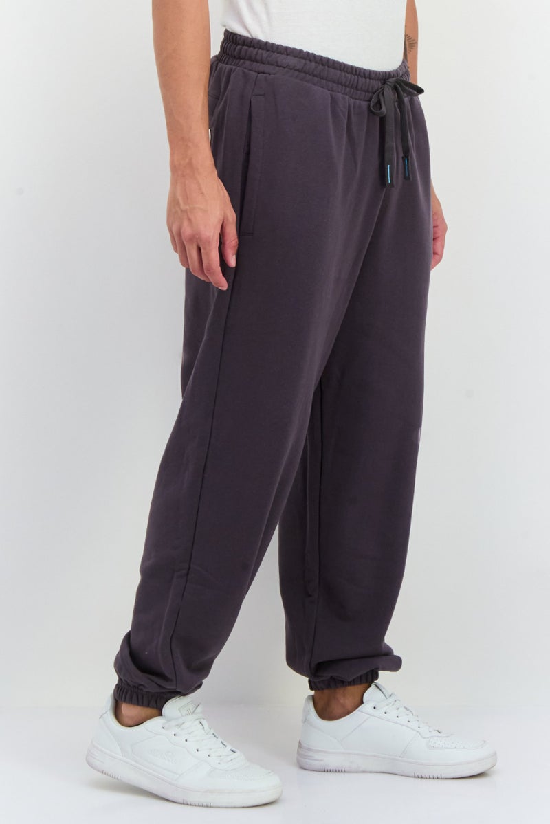 PUMA Puma x The Smurfs Men Sportswear Fit Drawstring Outdoor Sweatpants, Dark Grey - Image 5