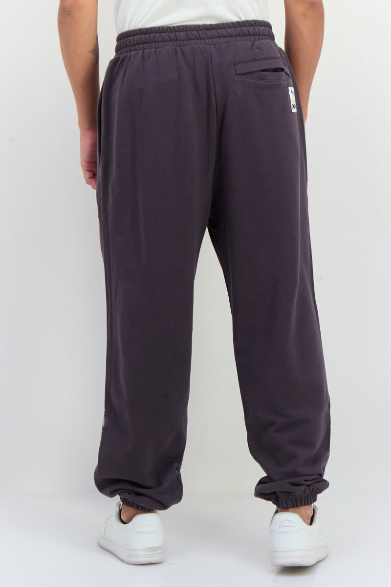 PUMA Puma x The Smurfs Men Sportswear Fit Drawstring Outdoor Sweatpants, Dark Grey - Image 3