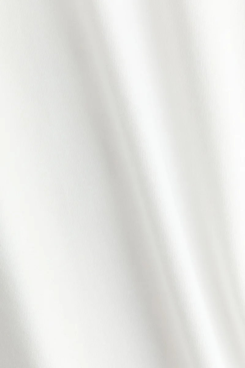 اتش اند ام تي-شيرت قطني بقصّة فضفاضة