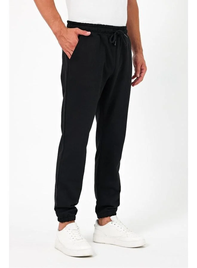 Mmetalic  Thick Black Men’s Jogger Sweatpants with Back Pocket, Elastic Cuff, Regular Fit, Unbrushed for Men | Best Price UAE