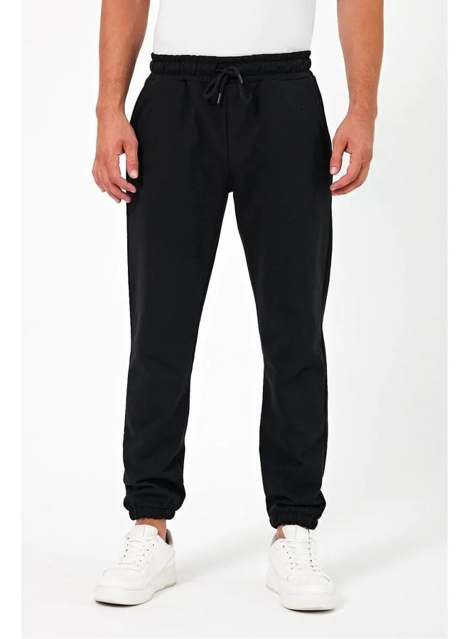 Mmetalic Thick Black Men’s Jogger Sweatpants with Back Pocket, Elastic Cuff, Regular Fit, Unbrushed