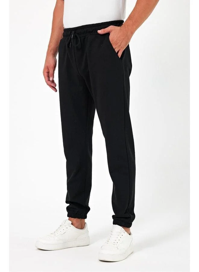 Mmetalic Thick Black Men’s Jogger Sweatpants with Back Pocket, Elastic Cuff, Regular Fit, Unbrushed