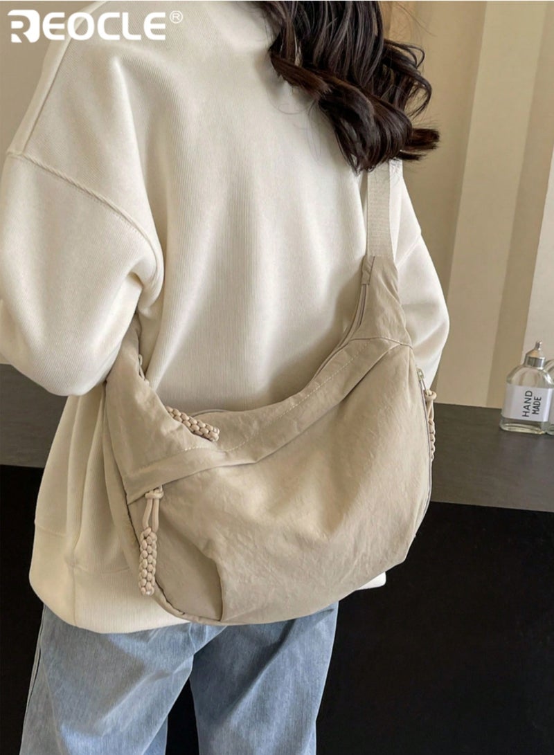 REOCLE Women's Hobo Bag Adjustable-Strap Slouchy Bag Roomy Soft-Structure Handbag with Textured Tassel Accents & Multi-Storage Pockets for Daily Commutes & Casual Outings - Image 1