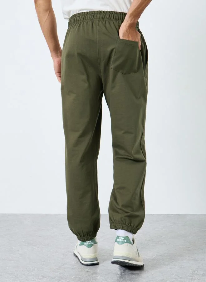 Styli Styli Relaxed Fit Slogan Print Joggers