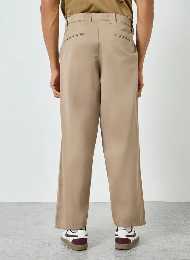 Styli  Men Beige Baggy Fit Trousers for Men | Best Price UAE