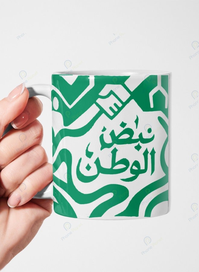 كوب سيراميك بمقبض متعدد الألوان بطباعة عبارة نبض الوطن