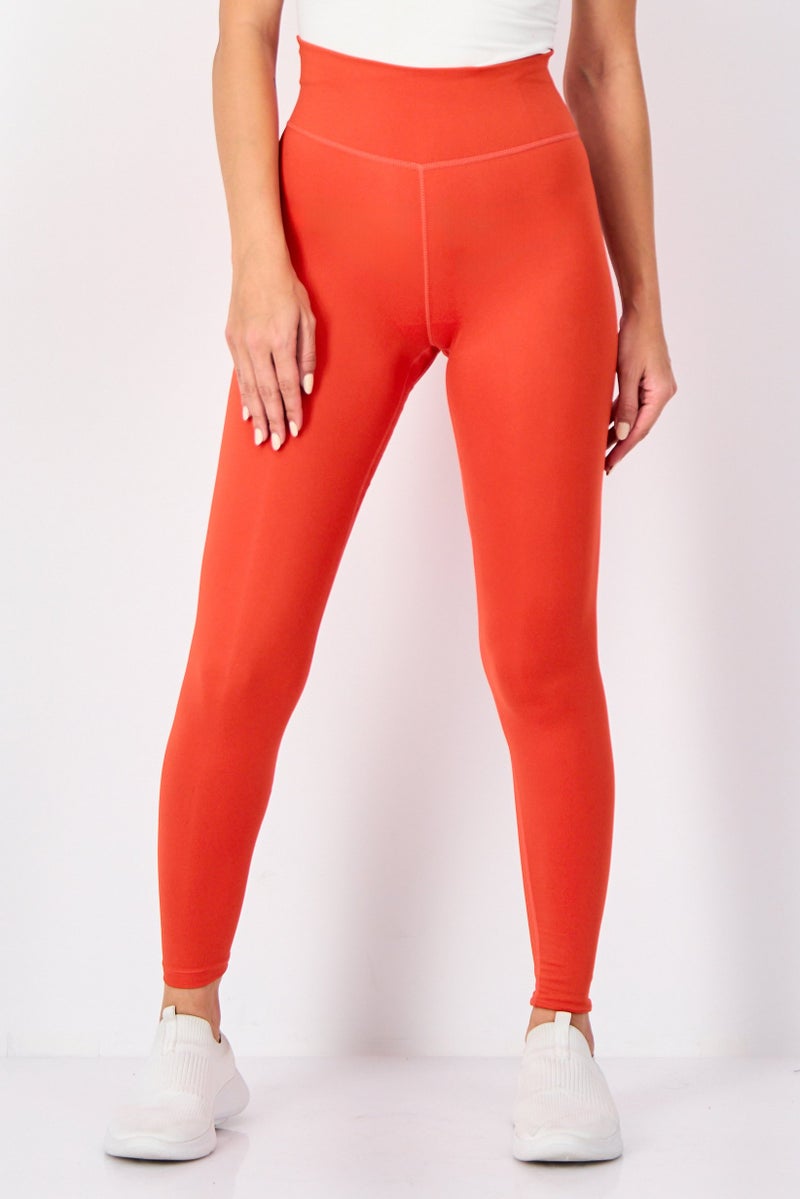 Nike Women Tight Fit Training Leggings, Light Red - Image 1