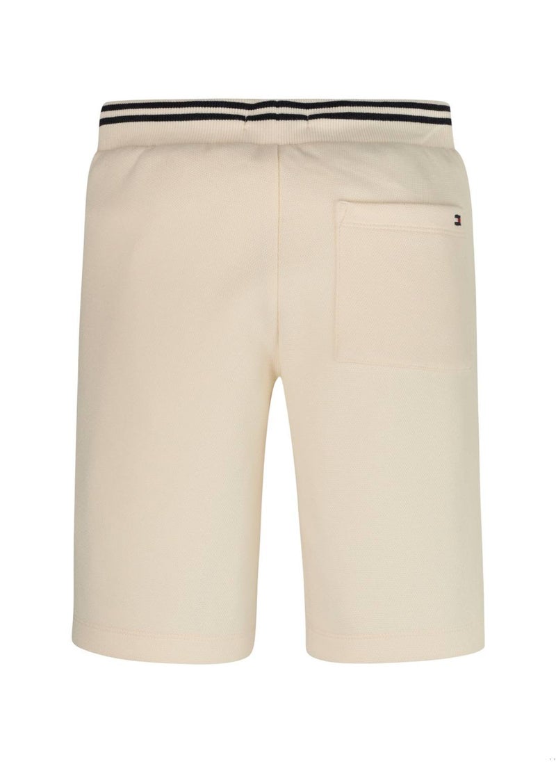 TOMMY HILFIGER - Boys' Hilfiger Monotype Archive Crest Logo Sweat Shorts -  Stretch cotton blend, Beige - Image 1