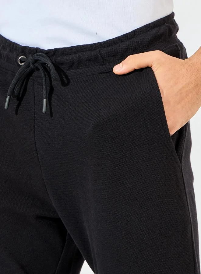 Styli Styli Slim Fit Pique Knit Pants with Turn-Up Hem