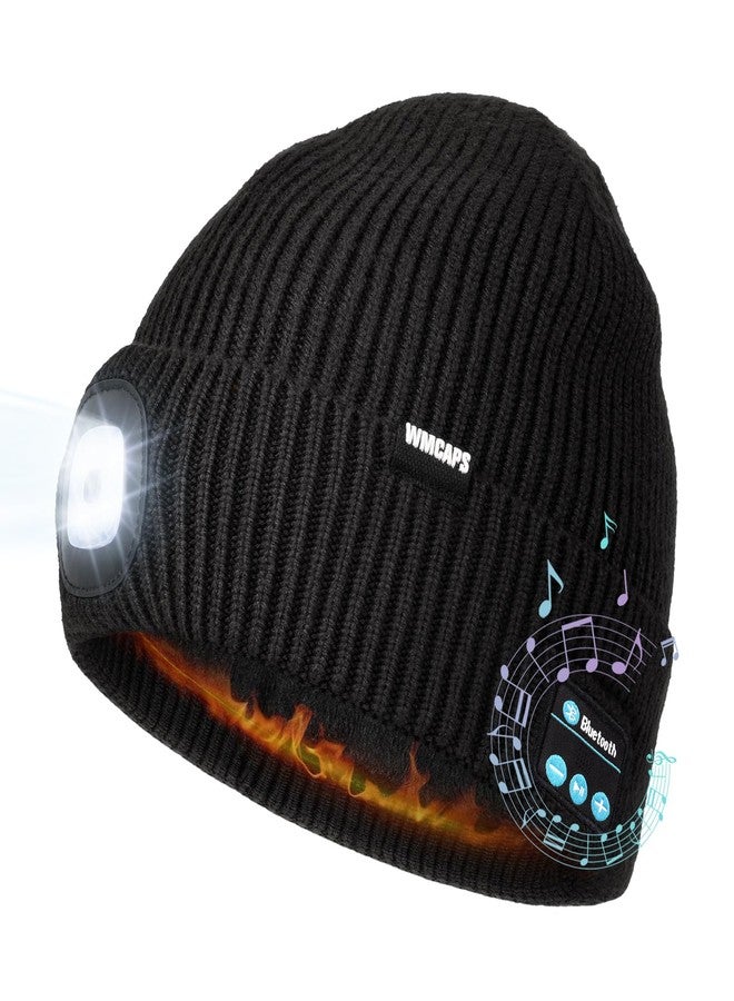 Wmcaps قبعة شتوية دافئة من Wmcaps مبطنة بالفرو مزودة بإضاءة LED وسماعات رأس لاسلكية مع ميكروفون ومكبر صوت، هدية مثالية للرجال والآباء، لون أسود - Image 1