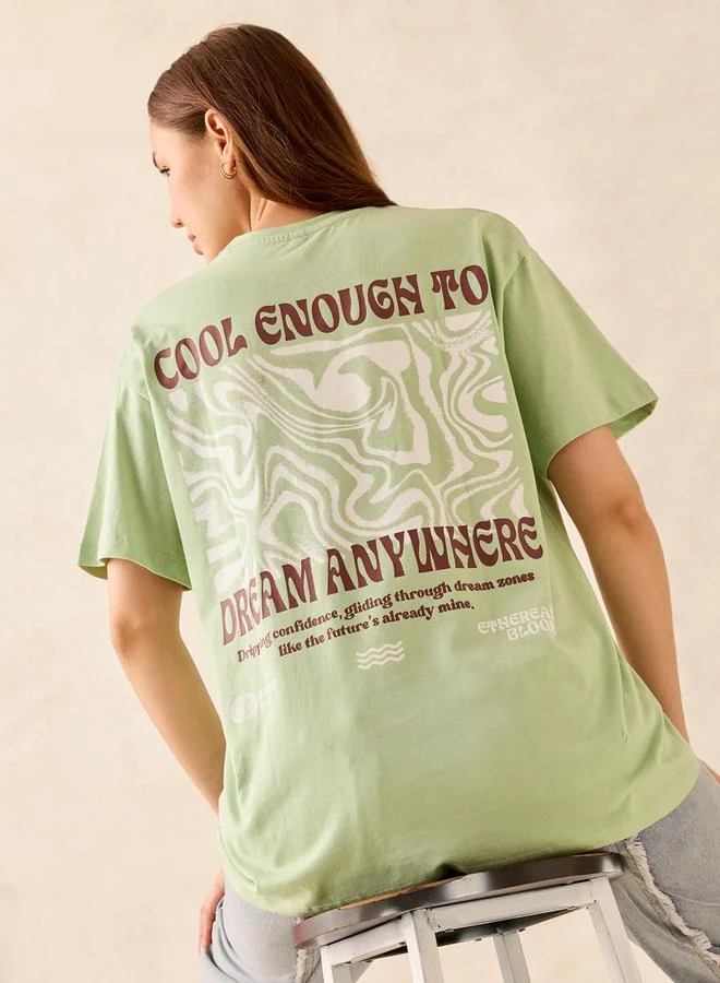 Outzidr  Green Graphic Oversized T-Shirt for Women | Best Price UAE