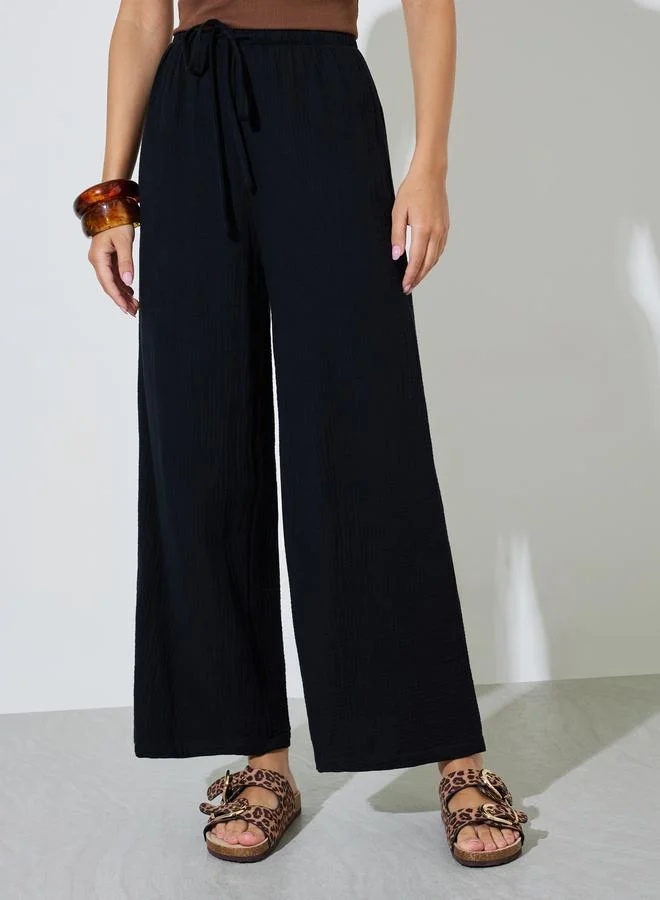 ستايلي Black Cotton Wide Leg Pants with Drawcord