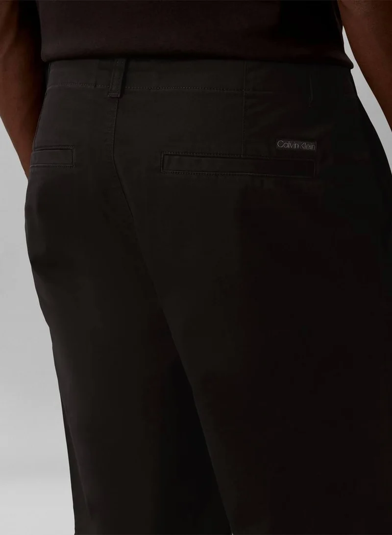 Calvin Klein Jeans Black 90s Loose Cropped Chino Trousers for Men | Best Price UAE
