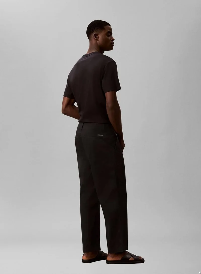 Calvin Klein Jeans Black 90s Loose Cropped Chino Trousers for Men | Best Price UAE