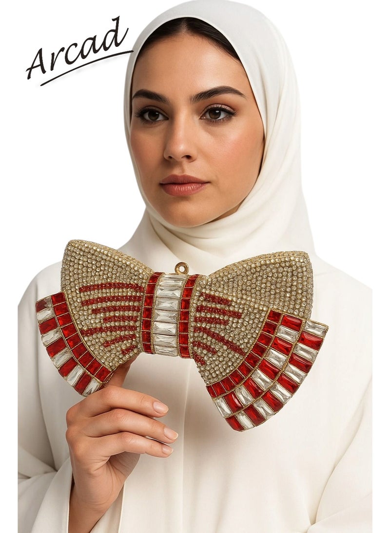 أركاد حقيبة كلاتش نسائية من أركاد للسهرات والحفلات بشكل فيونكة مزينة بالكريستال الأحمر والذهبي مع سلسلة - Image 1