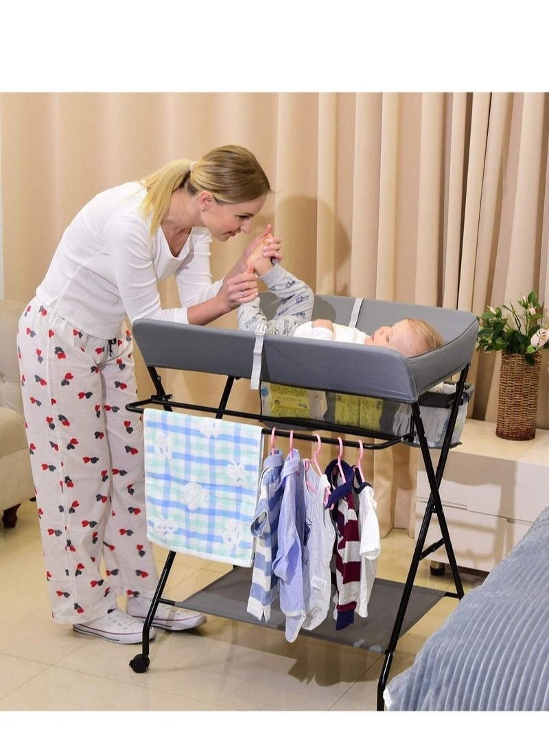 XiuWoo - Portable Baby Changing Table with Wheels and Storage Rack and Bag, Multifunctional Newborn Dressing for Clothes Massage - Image 1