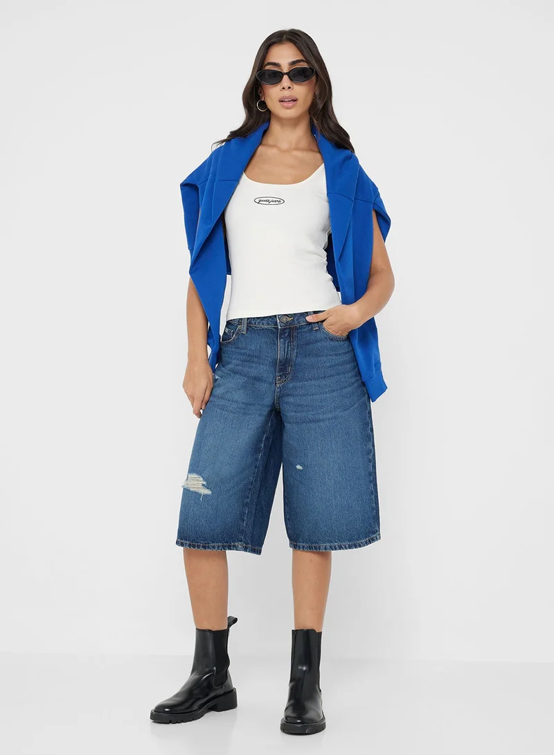 جيس جينز تفاصيل شعار مطرز تانك مضلع