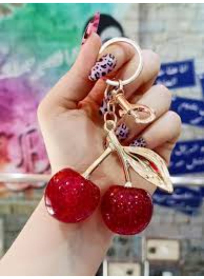 An elegant, fruity cherry-shaped medallion with a sophisticated and distinctive design — perfect for everyday decoration and a modern touch to travel and outdoor accessories! - Image 1