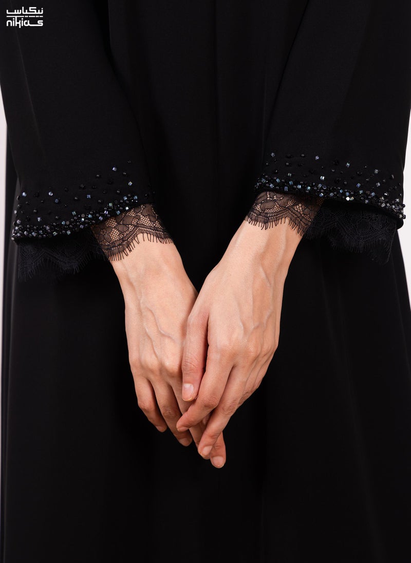 Nikias Elegant Cobra Crepe abaya featuring exquisite dantel and handwork - Image 3