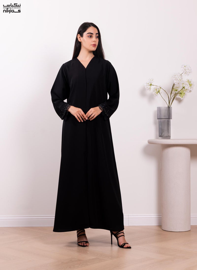 Nikias Elegant Cobra Crepe abaya featuring exquisite dantel and handwork - Image 1