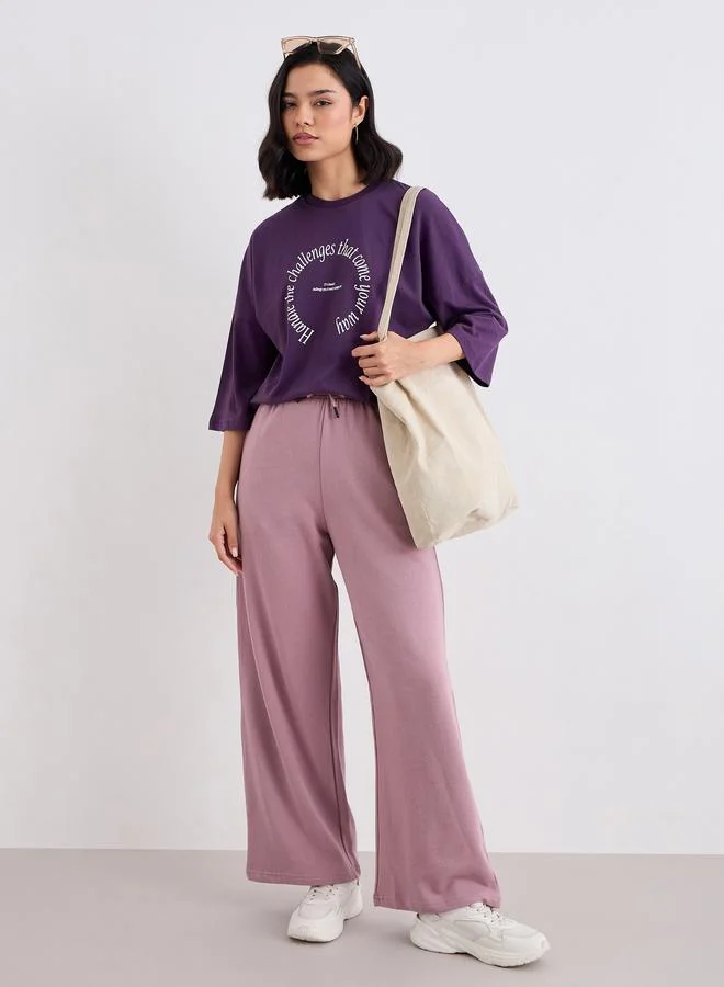 Styli Styli Purple Oversized Slogan Print T-Shirt
