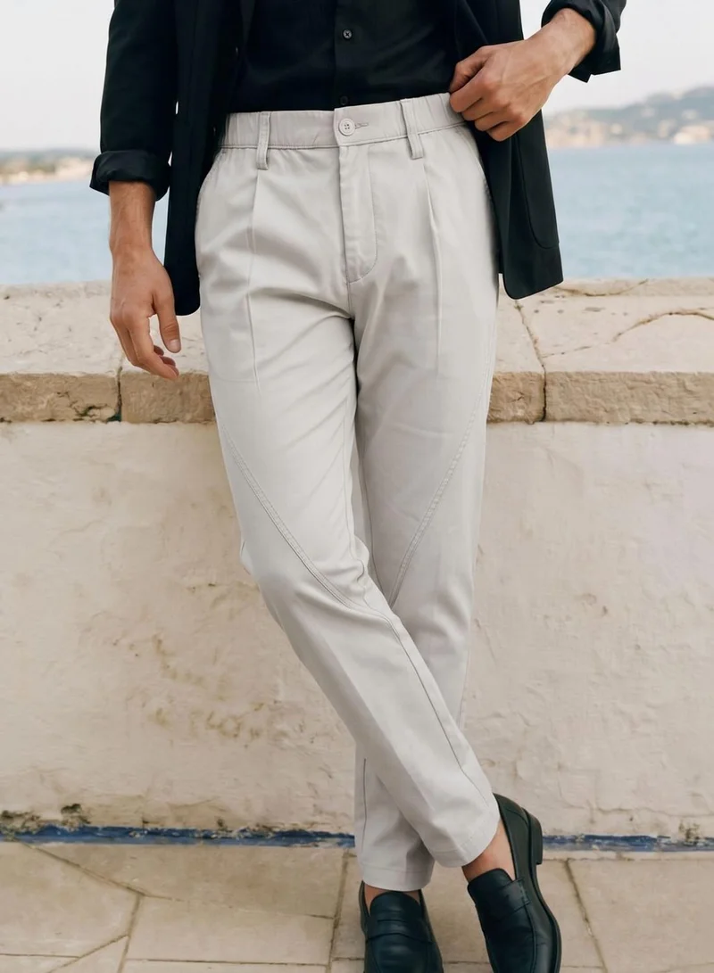 Dennis Lingo  Men Stone Poly Solid Full Chinos Tapered Trouser for Men | Best Price UAE