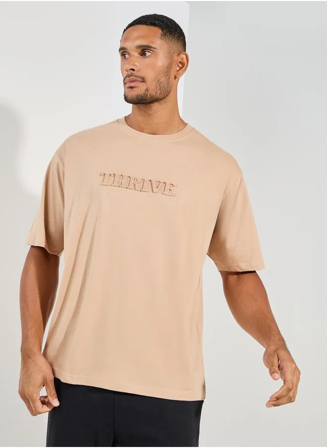 Styli Embossed Slogan Oversized Compact Jersey T-Shirt