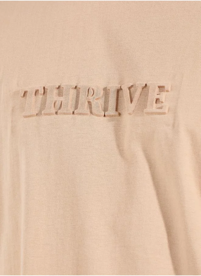 Styli Embossed Slogan Oversized Compact Jersey T-Shirt