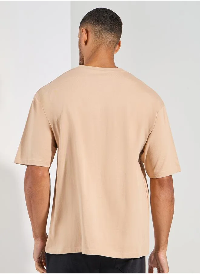 Styli Embossed Slogan Oversized Compact Jersey T-Shirt