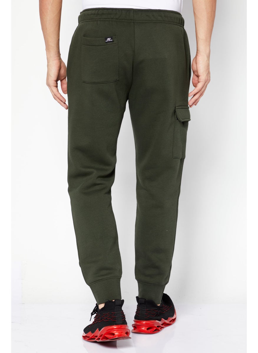 DKNY Sport - Men Sportswear Fit Brand Logo Jogger Pants, Olive - Image 1
