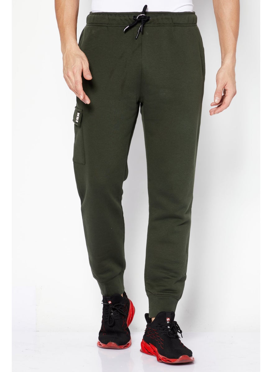 DKNY Sport - Men Sportswear Fit Brand Logo Jogger Pants, Olive - Image 1