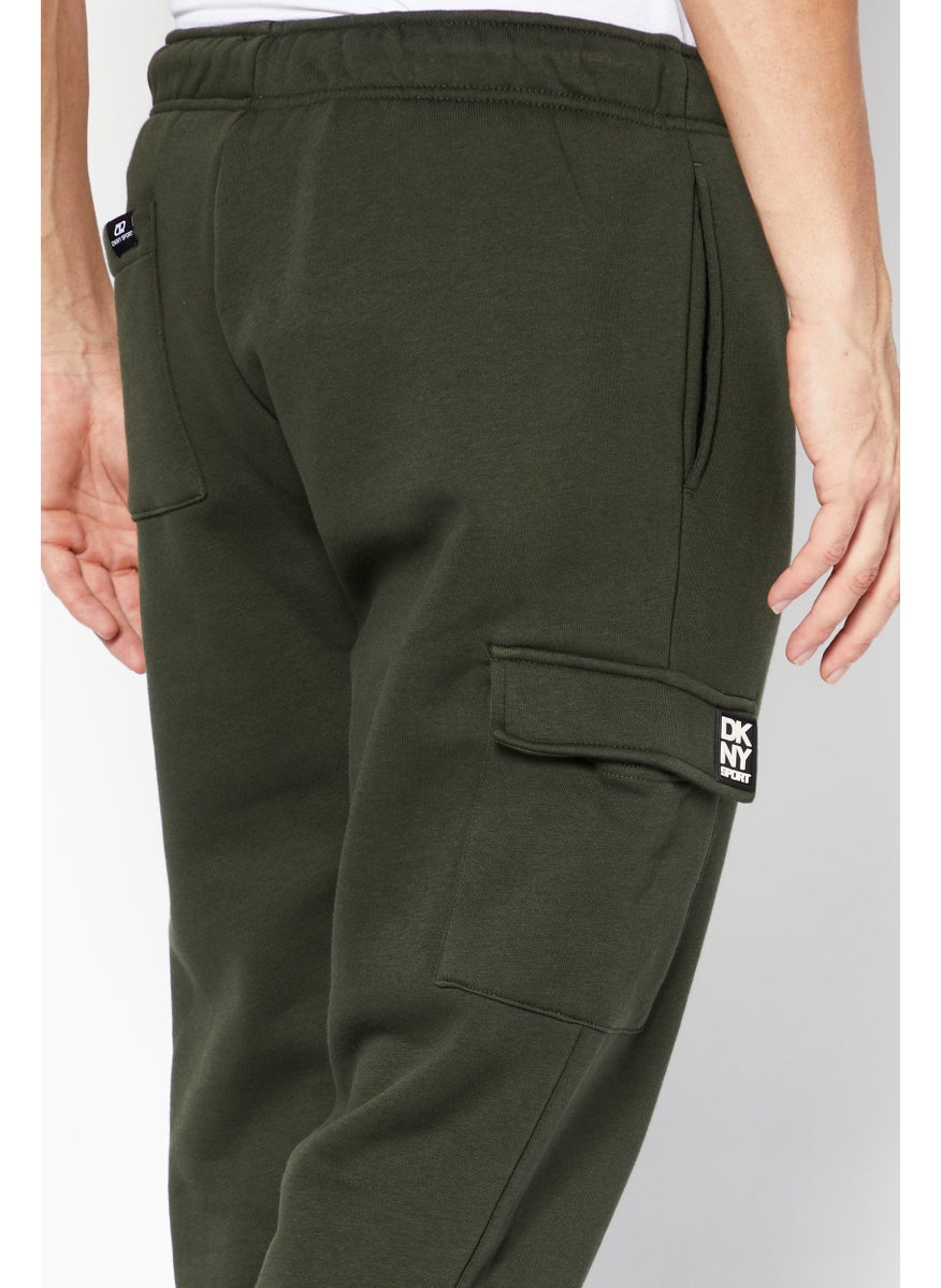 DKNY Sport - Men Sportswear Fit Brand Logo Jogger Pants, Olive - Image 1