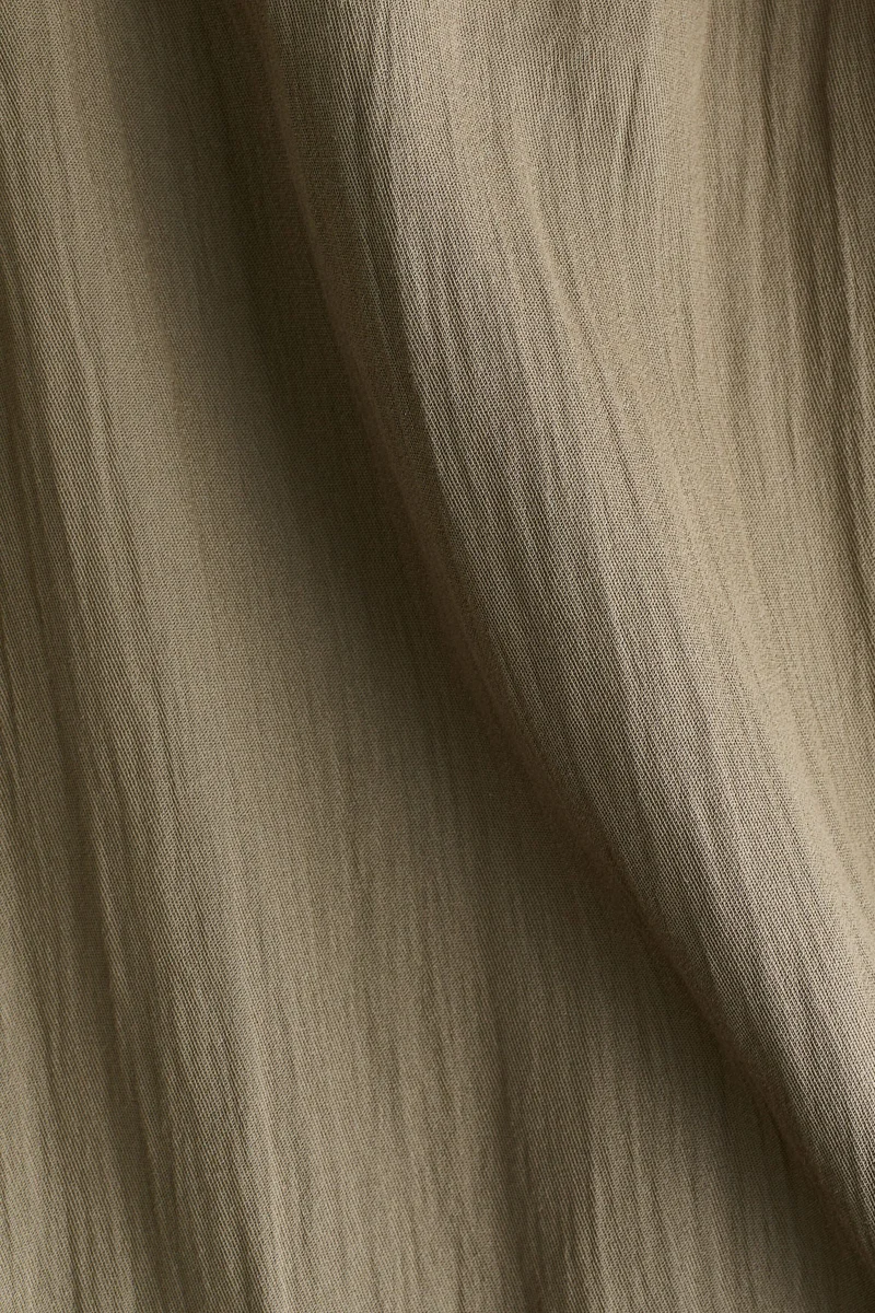 اتش اند ام بنطلون واسع بحافة مكشكشة