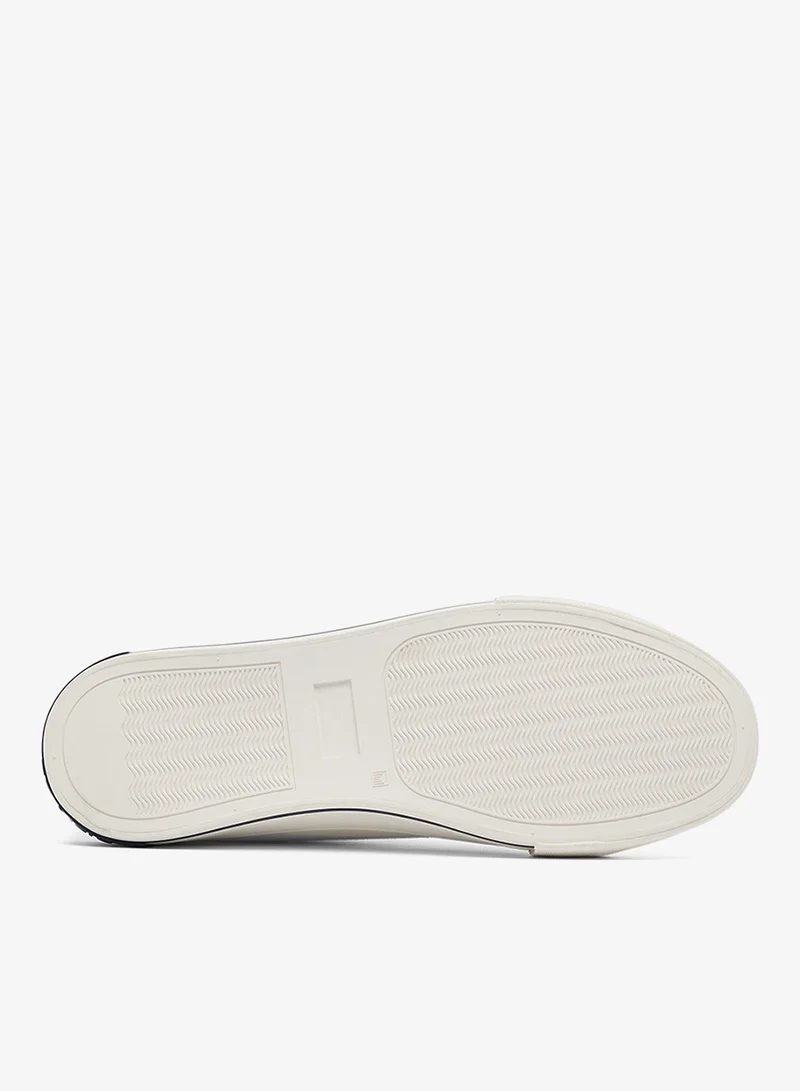 U.S. Polo Assn. White Men's White Low-Top Canvas Sneakers - Iconic Branding for a Clean Look Shoes for Men | Best Price UAE