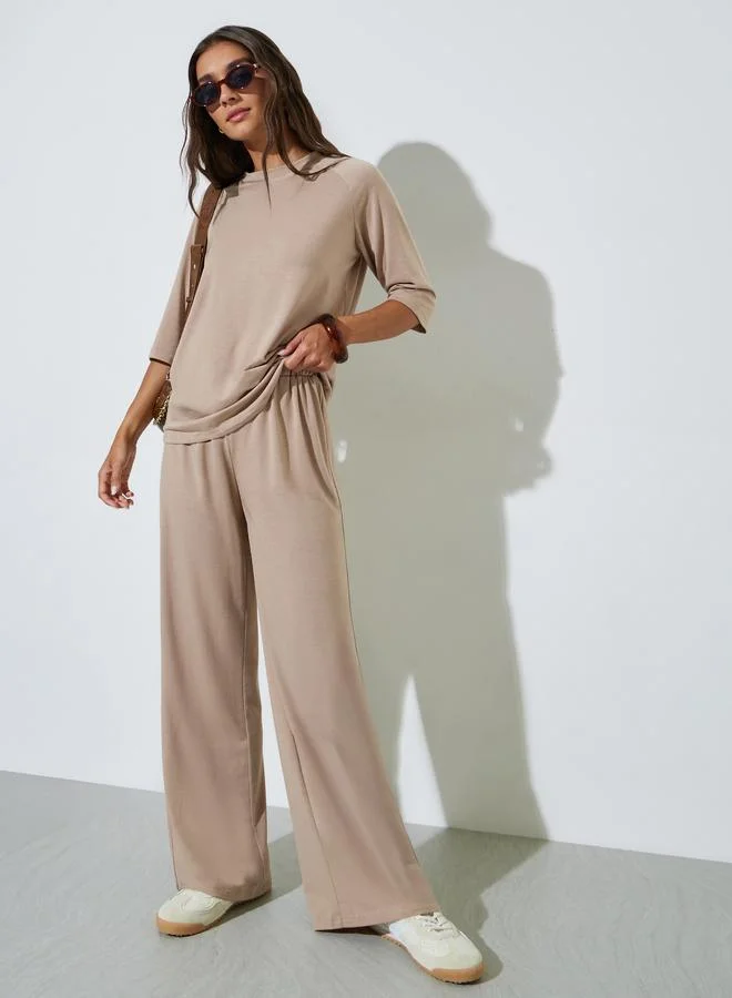 ستايلي Brown Solid Oversized T-Shirt and Wide Leg Pants Set