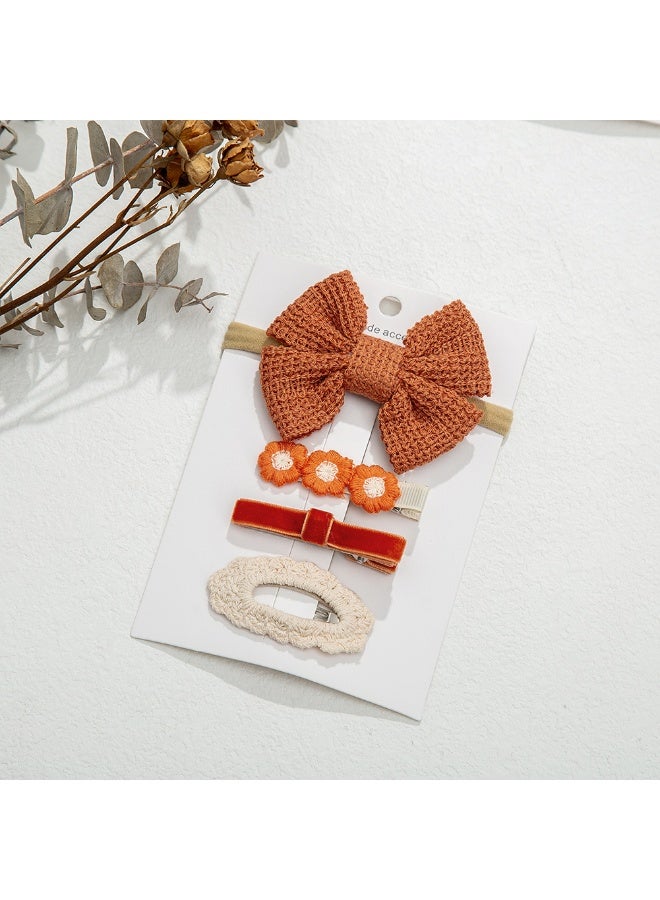 دىدانيالا طقم مشابك شعر فيونكة بشريط إيرا مع ربطة شعر للأطفال والبنات - برتقالي داكن - Image 1