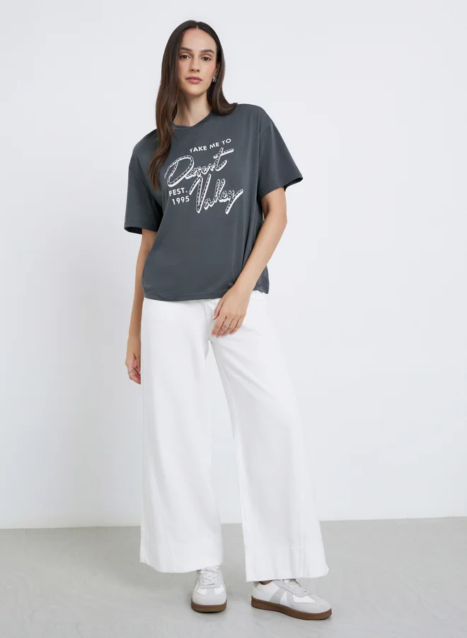 ستايلي Styli Women Charcoal Graphic Print Oversized T-Shirt