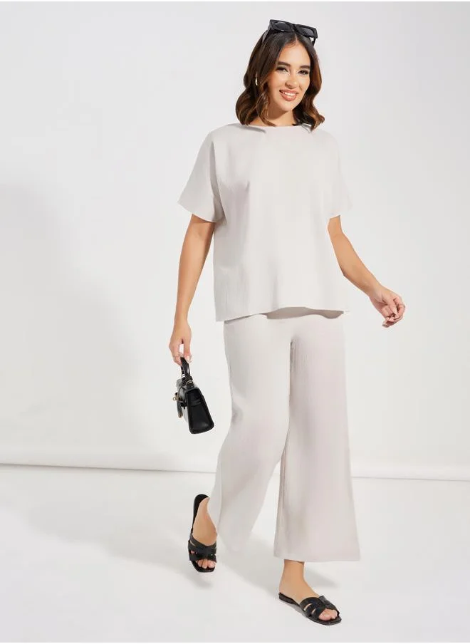 Styli Textured Round Neck Top & Wide Leg Pants Co-Ords