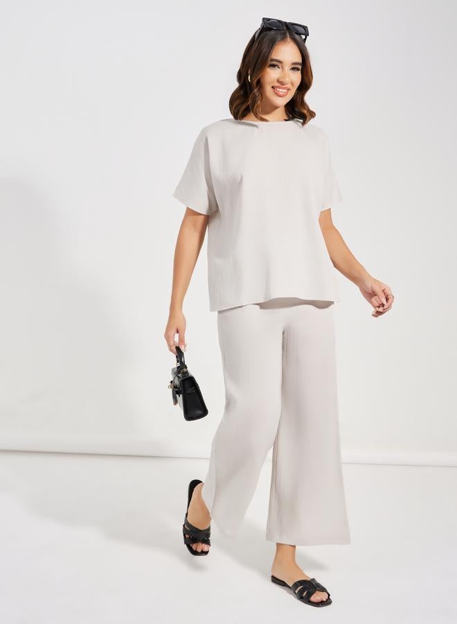 Styli Textured Round Neck Top & Wide Leg Pants Co-Ords  - Image 1