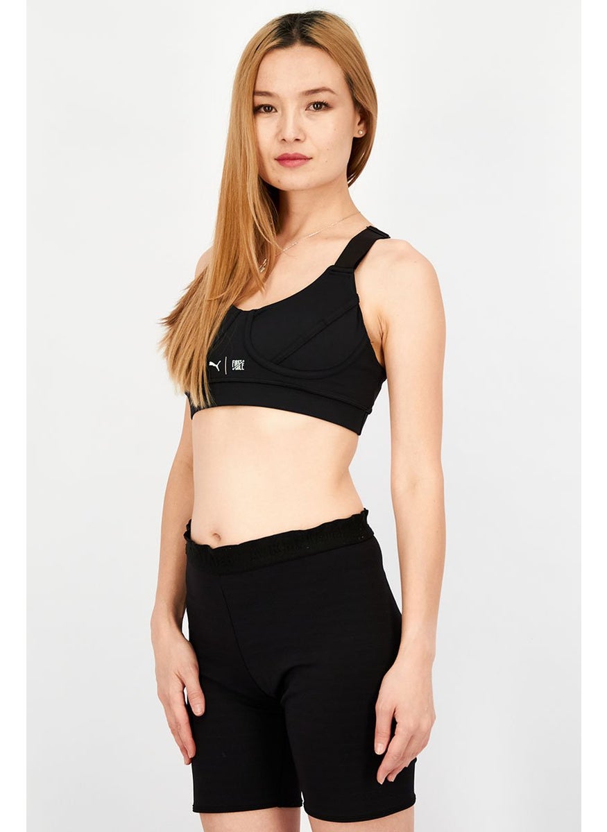 PUMA Women Sportswear Fit Graphic Print Padded Training Bra, Black  - Image 4