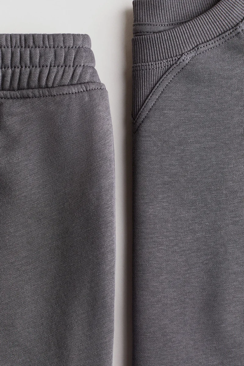 اتش اند ام طقم بنطلون رياضي وسويت شيرت- من قطعتين