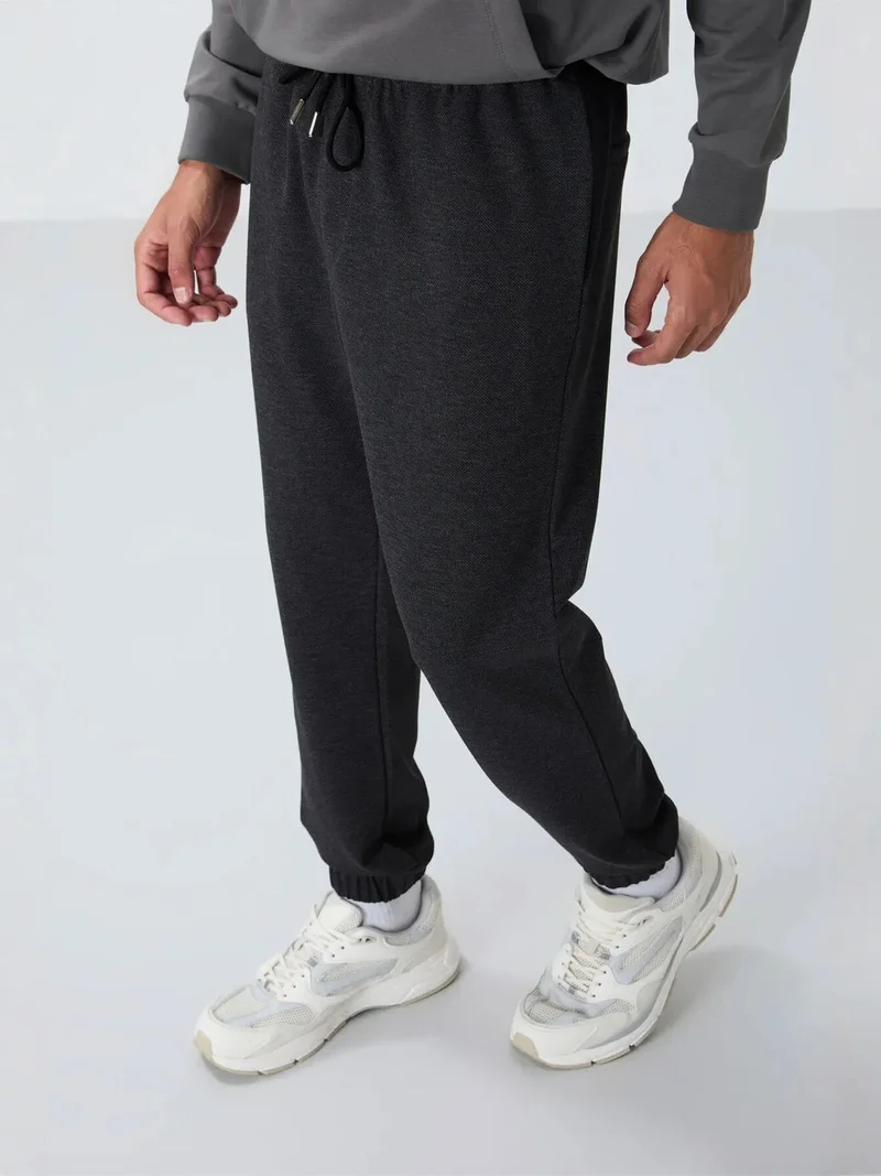 تومي لايف TOMMY Men's Regular Fit Fleece Sweatpants