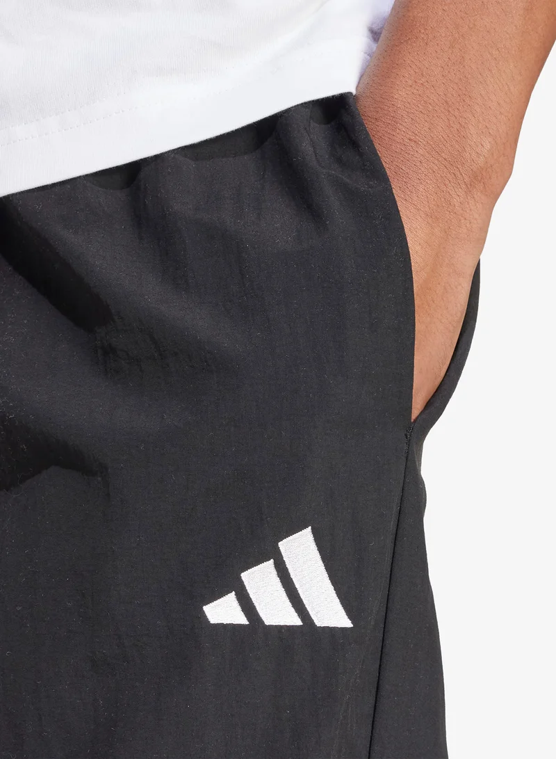 Adidas BLACK/WHITE Small Logo Woven Open Hem Sweatpants for Men | Best Price UAE