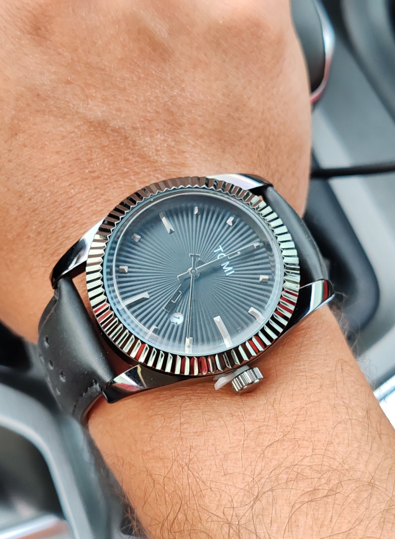 TOMI An elegant black analogue watch with a leather strap from TOMI for both men and women - Image 1