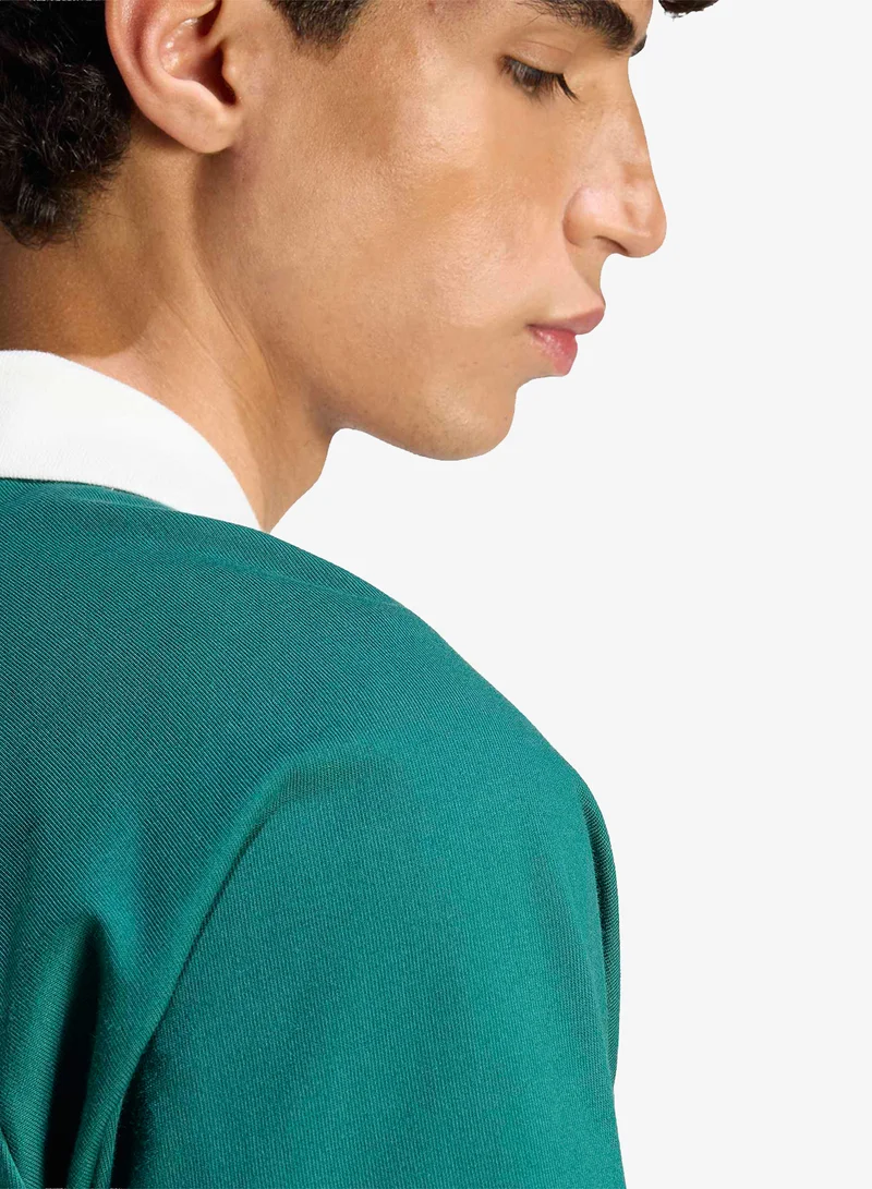 Adidas CGREEN/OWHITE Lux Tiro Script Graphic Polo for Men | Best Price UAE